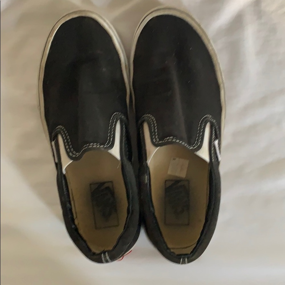 Black slip-on Vans